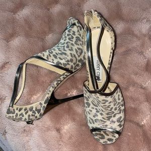 Good pre owned condition. Animal print, heels 4.75”